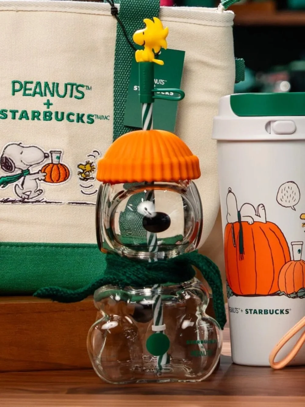 Starbucks Snoopy Clear Snowman Bottle with Orange Hat and Green Scarf